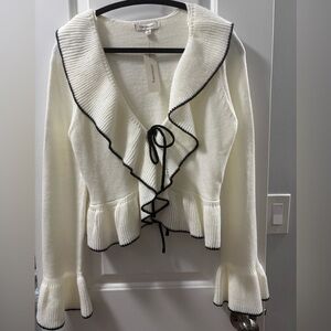Francesca’s Collection Cream Ruffle Cardigan with Black Edging